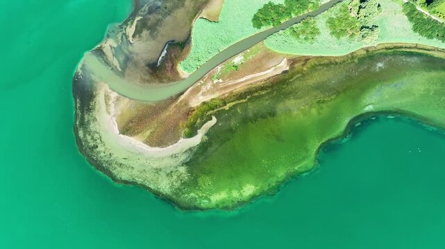 Aerial view, top down view of the mouth of the Stockacher Aach at low tide flowing into Lake &Uuml;berlingen. As a result of the deposits of entrained suspended matter and sediments from the inflow, the 