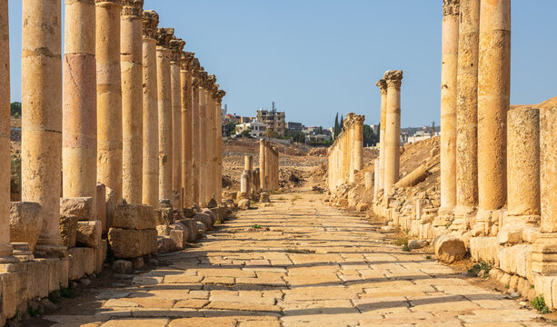 View of the ancient Roman columns lining the Cardo Maximus in the historic ruins of Jerash, Jerash Governorate, Jordan.