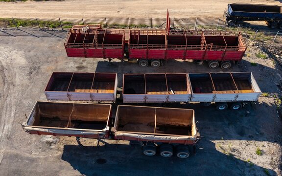 Aerial view of empty truck load bins arranged in a yard, showing steel frames and industrial transport equipment in Ladismith, Western Cape, South Africa.