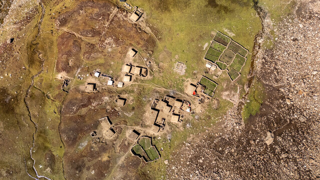 Aerial view of Supat Valley Kohistan featuring traditional stone houses, small agricultural plots, and rugged mountainous terrain in Kohistan, Khyber Pakhtunkhwa, Pakistan.