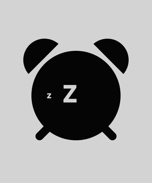 silhouette of a black alarm clock with the &ldquo;Zz&rdquo; sleep symbol