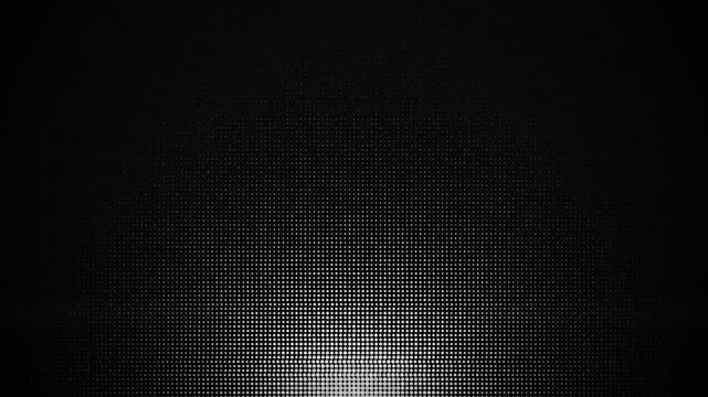 Abstract white LED dot matrix forming a semi-circle on black background