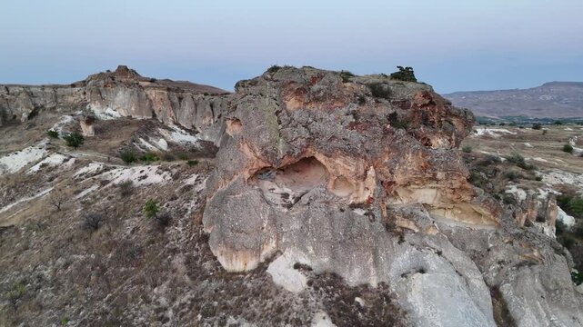 Aerial view of tuff rocks in volcanic valley near Urgup in Cappadocia, Turkey.