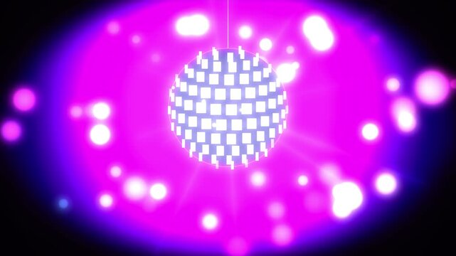 Disco ball glowing with bright light reflections rotates slowly in dark space for retro music dance party event