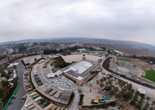 Latrun, Israel - 06 November 2025: Aerial view of the Yad La-Shiryon armored corps memorial site, featuring the museum, outdoor tank displays, amphitheater, and surrounding landscape.