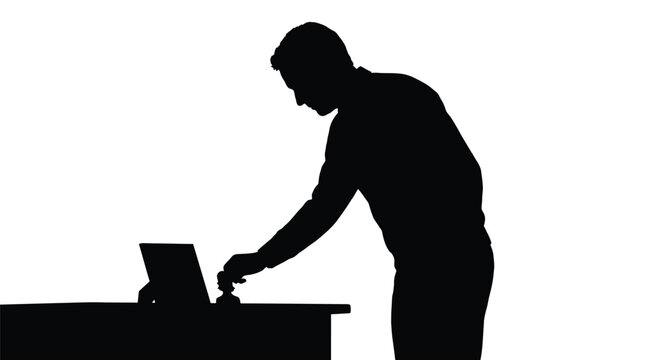 Silhouette of a man stamping a document on a desk