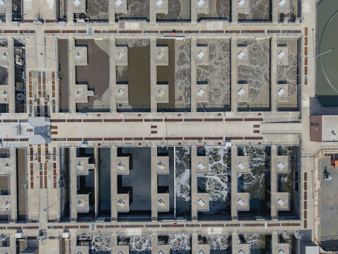 Green Bay, WI, United States - 22 September 2026: Aerial view of the Green Bay Metropolitan Sewerage District, showing aeration tanks and concrete infrastructure.