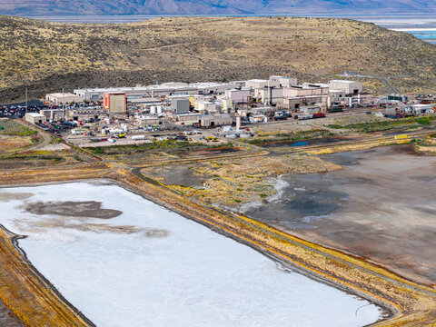 Ogden, Utah, United States - 30 September 2026: Aerial view of the Western Zirconium Inc factory, a Westinghouse facility, with industrial buildings and wastewater evaporation ponds.
