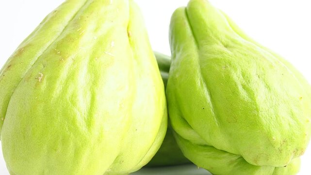 Fresh Green Chayote Squash on White Background, Close-up of Raw Sechium Edule Vegetable