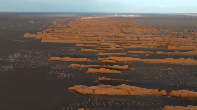 Aerial view of the unique wind-eroded rock formations of Yadan Geological Park in the Gobi Desert, Jiu Quan Shi, Gan Su Sheng, China.