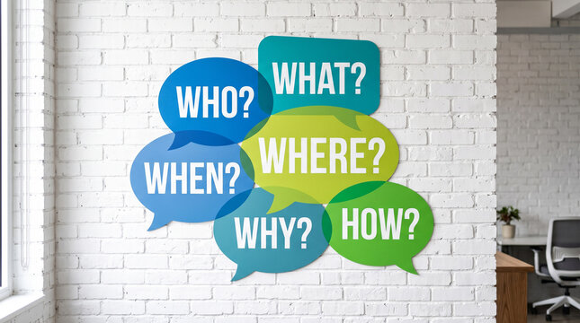 Colorful speech bubbles with the five ws and h questions on a white brick wall background