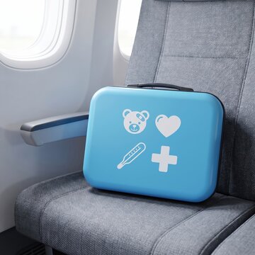 Blue pediatric medical first aid kit resting on an airplane seat