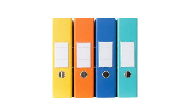 Four bright office ring binders in yellow, orange, blue, and turquoise stand vertically in a row side by side against a pure white background, featuring clear plastic label holders and metal rings