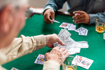 Fototapeta premium Card game with money stakes.