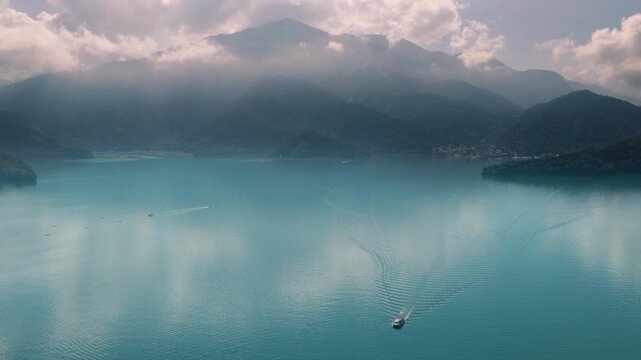 Aerial drone footage over the sun moon lake at morning in Taiwan