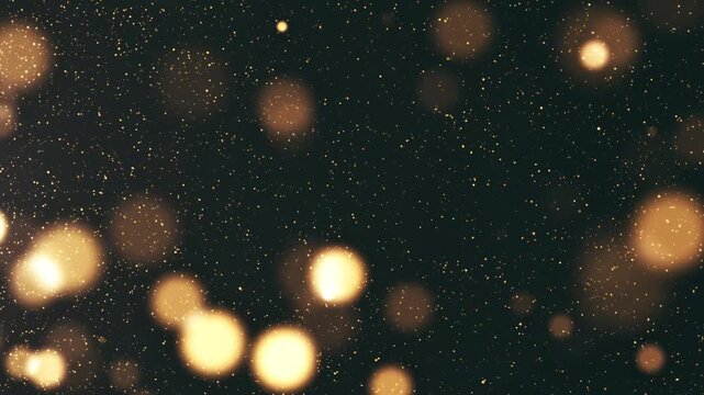 Abstract dynamic animation featuring glowing golden bokeh light orbs floating and shimmering against a dark background, filled with falling glitter particles.