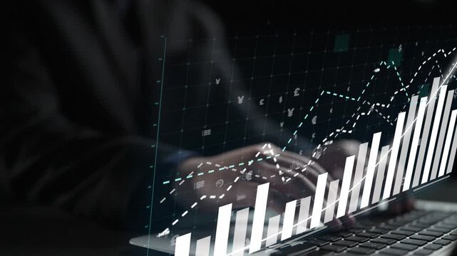 A business professional interacts with a laptop displaying digital graphs and data trends, symbolizing financial growth and modern technology in the workspace. Copula
