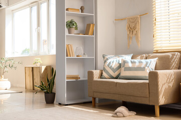Home comfort and interior design, cozy living room with beige sofa and natural sunlight for modern apartment lifestyle and residential real estate © Pixel-Shot