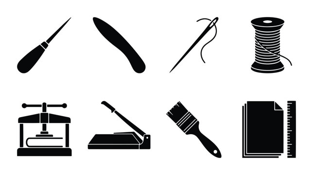 Bookbinding tools set with awl, bone folder, needle, thread, press, cutter, brush and ruler for craft