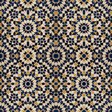 Traditional Moroccan Zellige tile pattern with geometric star motifs in navy blue cream and mustard yellow distressed ceramic texture