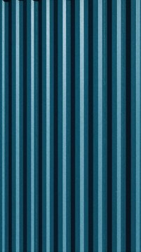 Blue vertical textured wall with parallel grooves. Corrugated metal surface shows deep teal, navy stripes. Industrial container side siding background for design. Minimalist pattern with geometric