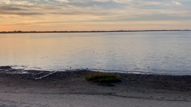 Impressive point of view of the sunset over Dangast beach at the german north sea