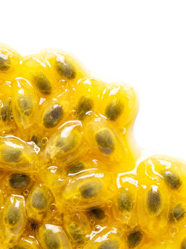 Close-up of passion fruit pulp with seeds isolated on white background