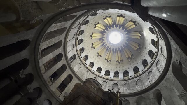 Jerusalem, Israel, October 5, 2026. Camera rotates around the dome of the Church of the Holy Sepulchre before tilting down toward the Edicule, the shrine housing the Tomb of Jesus.