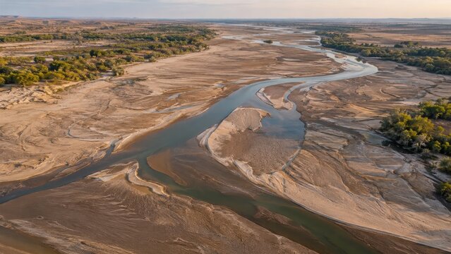 drought river winds through a dry landscape