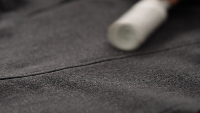 cleaning coat with lint roller