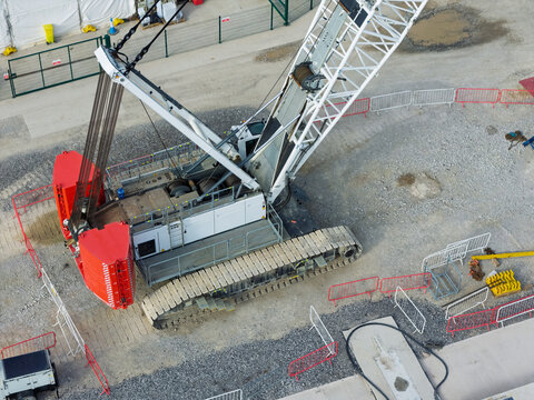 Aerial view of a large crawler crane at a high speed rail construction site in the United Kingdom.
