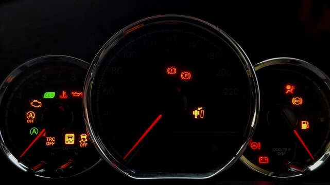 Car dashboard display showing active warning indicators like check engine, battery, and oil light when starting the vehicle.