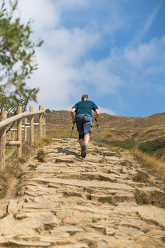 Man walking up jacobs ladder footpath in peak district