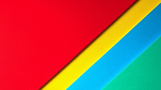 Red Yellow Blue Green Paper Layers Create Bold Diagonal Abstract Background Design
