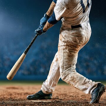 Baseball player batter swinging bat hitting ball