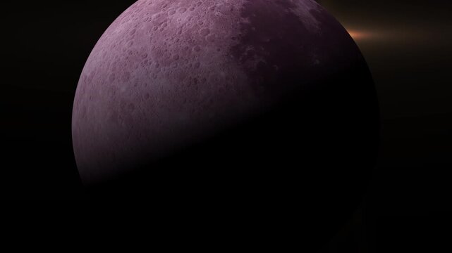 Close up view of the moon surface with dark shadows and bright light