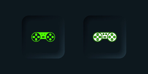 Green Game controller or joystick for game console icon isolated on black background. Black square button. Vector © Iryna