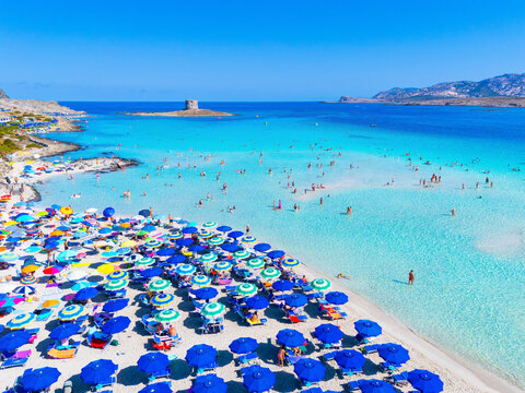 Sardinia, Italy. La Pelosa Beach with its turquoise lagoon and crystal-clear waters near Stintino.