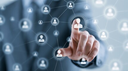 Fototapeta premium Connected network of user profiles highlighted by a hand, representing digital collaboration and social interaction concept