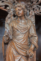 Fototapeta premium Leuven - The Carved angel as symbol of virtuousness form St. Michaels church (Michelskerk) 