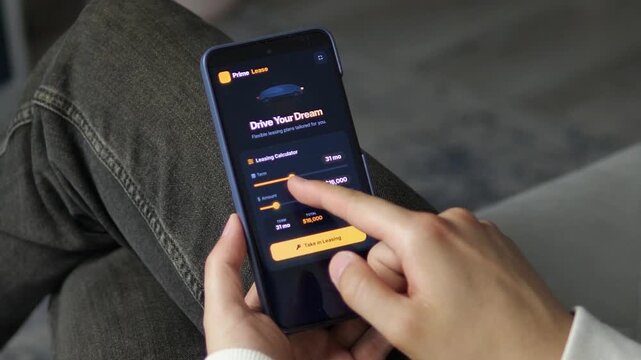 Person adjusts a car leasing calculator on a smartphone, comparing contract length and vehicle value to estimate monthly payments and plan flexible mobility costs.