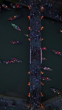 Vertical video,Top view of Hoi An Vietnam The ancient city of UNESCO World Heritage in Quang Nam Province It is a popular tourist attraction where colorful lantern boats sail on the river.