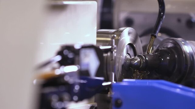 A close-up of precision movements machinery CNC operating cutting through a metal sheet in a modern chip production workshop, showcasing the detailed control panel, high-end manufacturing equipment.
