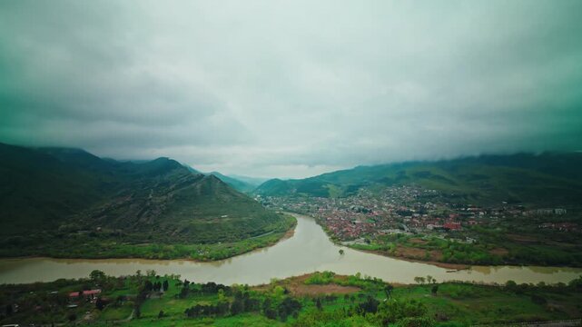 Low cloud over Mtskheta and the confluence of the Mtkvari and Aragvi rivers seen from the Jvari ridge, Georgia.