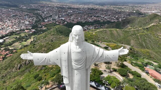 Aerial view of the Christ of the Concord Monument overlooking the city of Cochabamba, Departamento de Cocha, Bolivia.