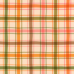 Fototapeta premium Brown, orange, green and pink autumn plaid vector seamless pattern, Wavy irregular lines fall check for Thanksgiving designs and backgrounds and kitchen textiles
