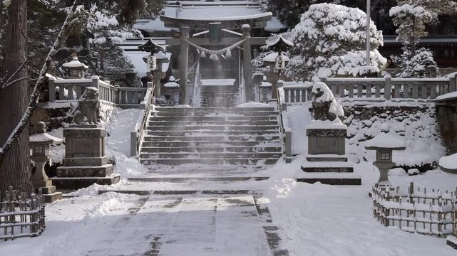 The historic Sakurayama Hachimangu Shrine blanketed in snow during winter in Takayama, Hida region, Gifu, Japan.