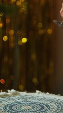 Vertical video. Woman drinking champagne during festive event. Dating, celebrating Valentines day, New Year, anniversary or birthday. 