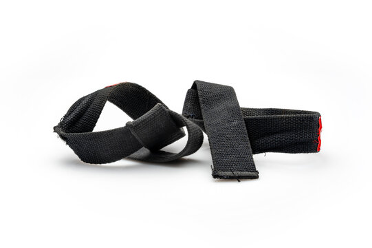 Black lifting straps with used marks on it. On a white background.