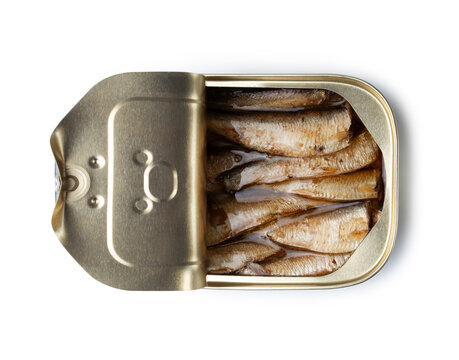 Open can of smoked sprats in oil isolated on white background close-up